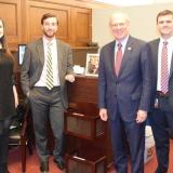 Rep. John Rose posing with others
