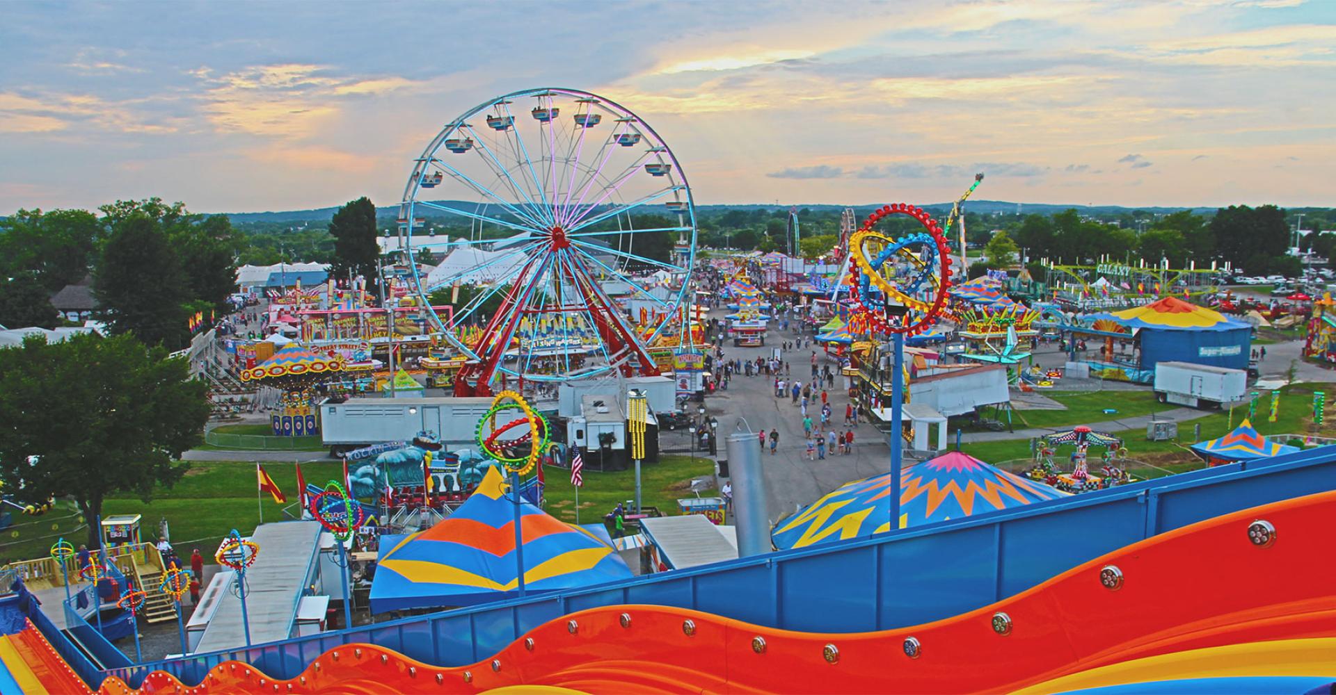 Overhead view of local fair with rides