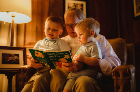 Congressman Rose reading to his two sons